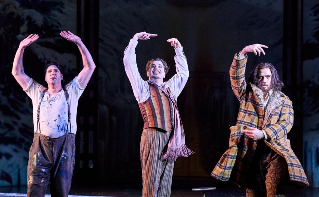 Luke Gabbedy as Marcello, Shane Lowrencev as Schaunard and David Parkin as Colline in Opera Australia’s production of La Bohème 2025 © Keith Saunders