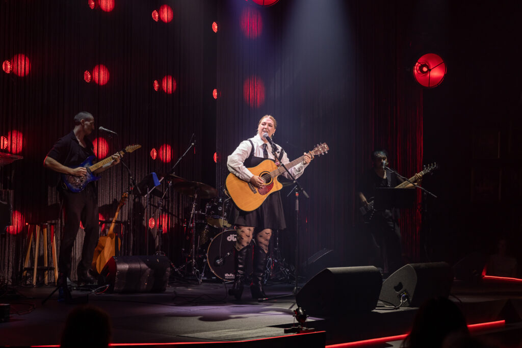 Natalie Abbott and band in Bad Hand. Photography by Jacquie Manning