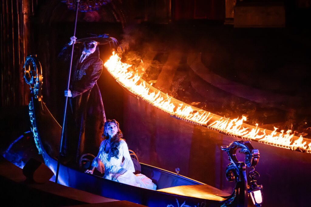 Jake Lyle as The Phantom and Amy Manford as Christine Daaé in Handa Opera on Sydney Harbour's 2026 production of The Phantom of the Opera. Credit Daniel Boud