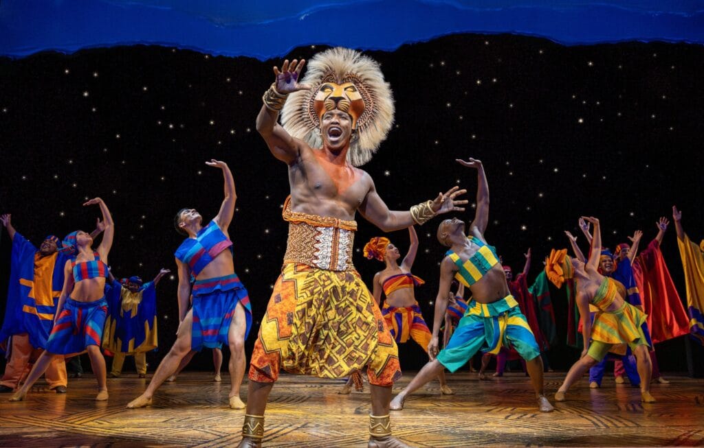 Aphiwe Nyezi as Simba. The Lion King. (c)Disney. Photo by Daniel Boud