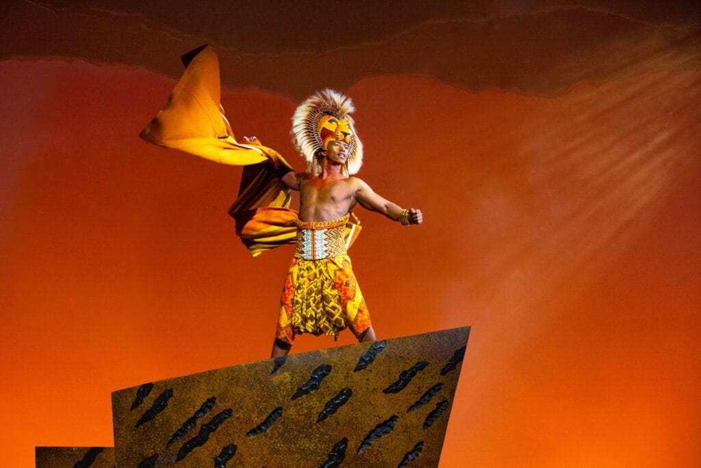Aphiwe Nyezi as Simba. The Lion King. ©Disney. Photo by Cylla von Tiedemann